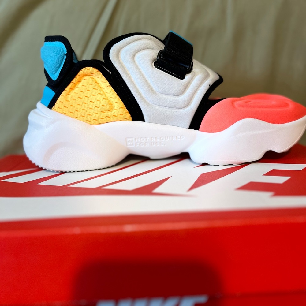 Women’s Nike AquaRift sneakers. Gold, pink, aqua, grey, white